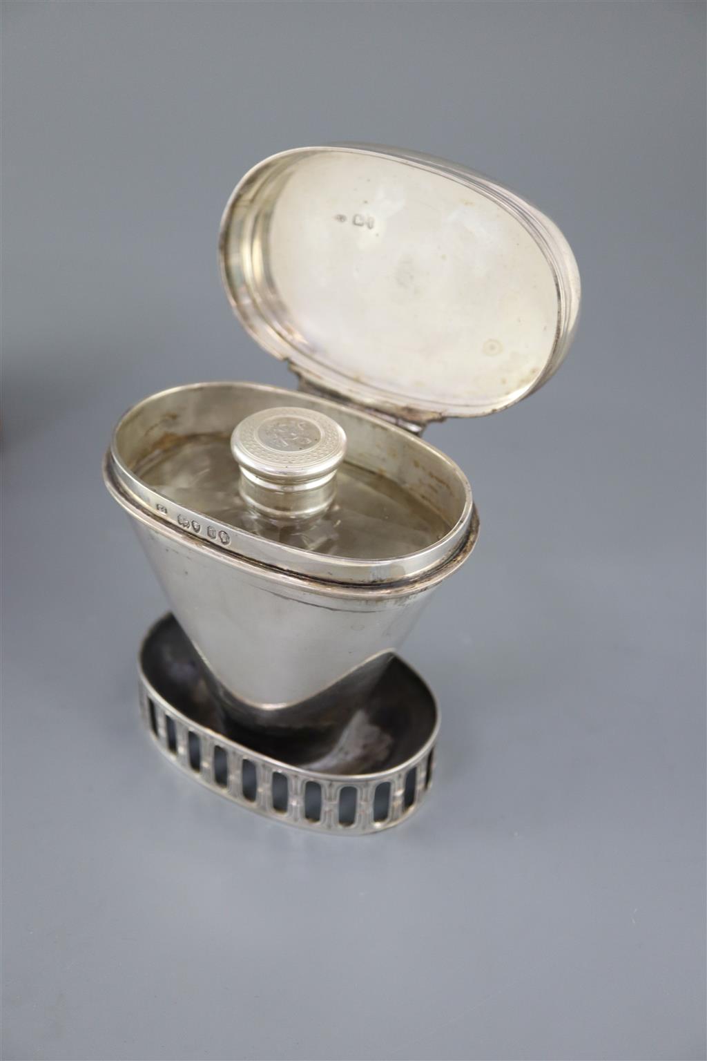 A leather cased Victorian travelling silver hip flask and warmer, by Thomas Johnson I,